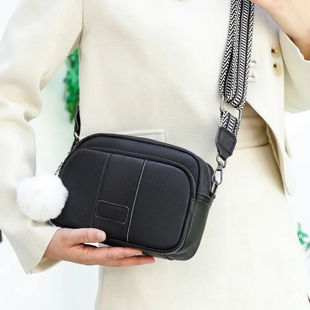 démo sac en bandoulière cuir et pompon