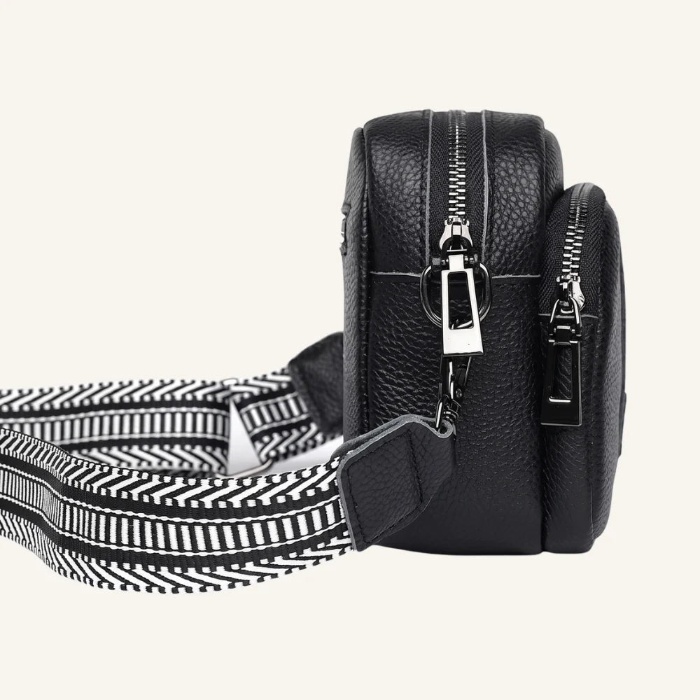 sac bandoulière cuir et pompon côté